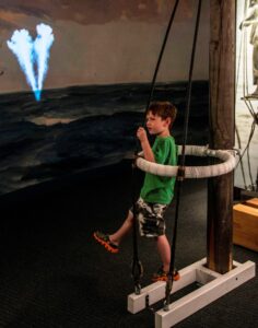 child at voyaging in the wake of the whalers exhibit at mystic seaport museum