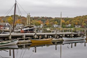 boats in front of middle wharf  at mystic seaport museum