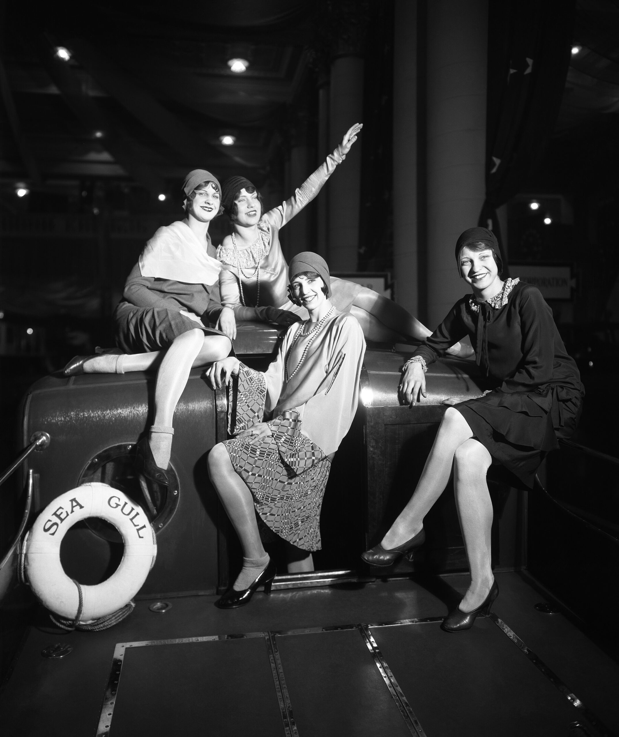 Models on boat SEA GULL. The boat was a Robinson Cruiser and the image was made during the 1929 Motor Boat Show in New York City. (Mystic Seaport Rosenfeld Collection 1984.347.33774)