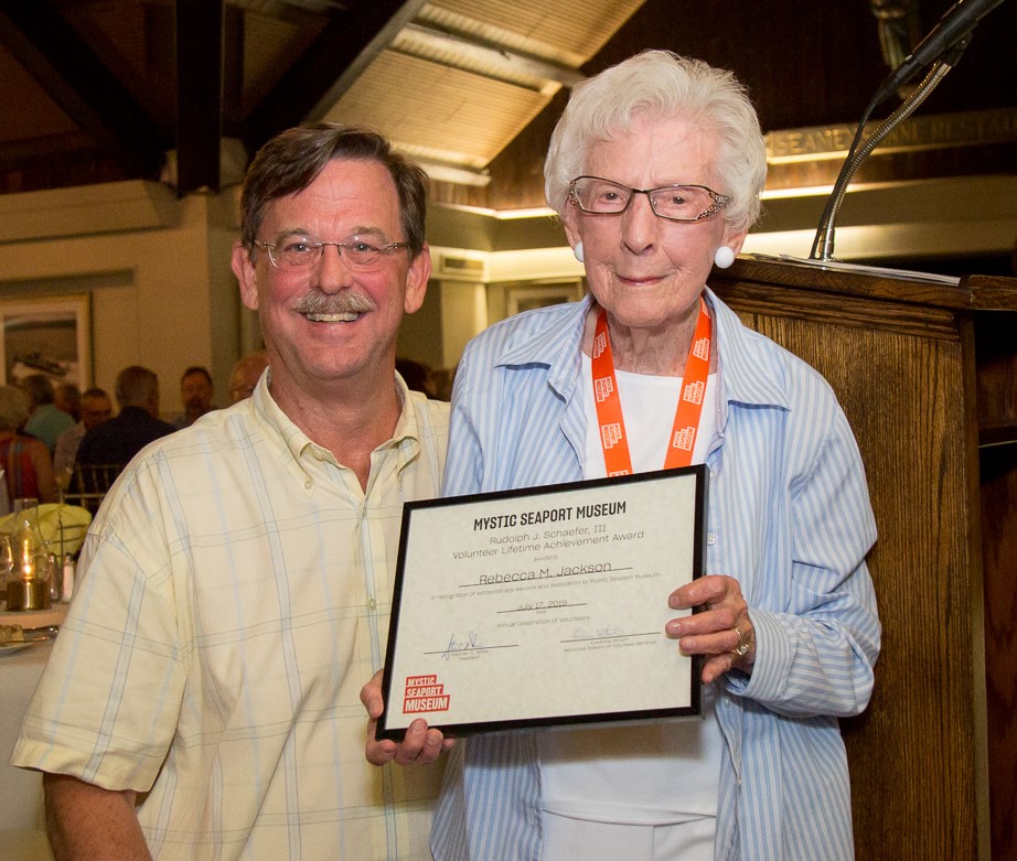 Museum President Steve White with Becky Jackson, winner of the 2019 Rudolph J. Schaefer III Volunteer Lifetime Achievement Award.
