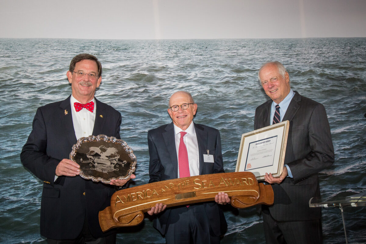 From left: Museum president Steve White, America and the Sea Award honoree Tom Whidden, and Hall of Fame sailor Gary Jobson at the America and Sea Award gala at Mystic Seaport Museum on October 23, 2020.